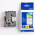 Brother TZ-145 / TZe-145, 18mm x 8m, testo bianco/nastro trasparente, nastro originale